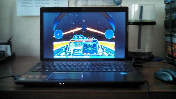 Playing the STAR WARS: X-WING video game on my laptop computer. On-screen is an A-Wing fighter that I'm flying for this mission.