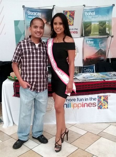 Posing with a model during ASEAN Fest 2018 at Puente Hills Mall in City of Industry, California...on May 26, 2018.
