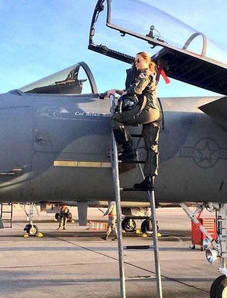 Brie Larson, who plays Carol Danvers in CAPTAIN MARVEL, poses near the cockpit of an F-15 Eagle fighter jet at Nellis Air Force Base in Nevada. Brie Larson, who plays Carol Danvers in CAPTAIN MARVEL, poses near the cockpit of an F-15 Eagle fighter jet at Nellis Air Force Base in Nevada.