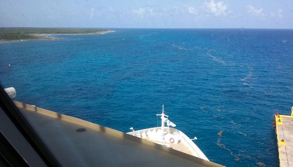 A snapshot of Costa Maya's coastline and Norwegian Jade's bow from inside the Spinnaker Lounge on Deck 13 of the ship, on March 21, 2018.