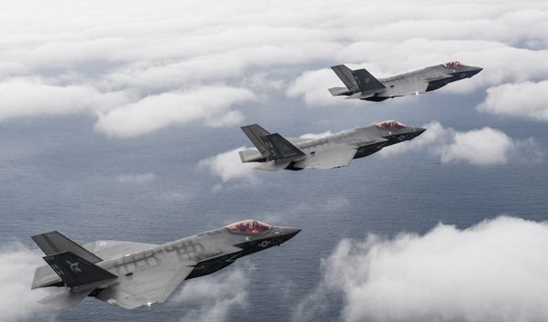 Three F-35C Lightning II aircraft fly in formation off the coast of Florida on February 1, 2019.