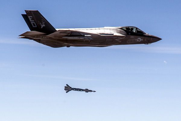 An F-35C Lightning II drops an inert GBU-12 Paveway II smart bomb onto a moving target at Naval Air Weapons Station China Lake in California...on March 29, 2017.