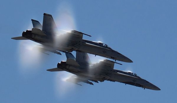 Two F/A-18 Hornets fly just below the speed of sound above Marine Corps Air Station (MCAS) Miramar in San Diego County, California...on September 29, 2018.