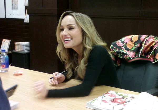 Giada De Laurentiis mingles with another fan during the signing of her new book GIADA'S ITALY at The Grove's Barnes & Noble bookstore in Los Angeles...on April 24, 2018.
