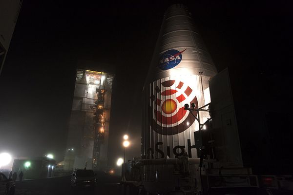 The Atlas V payload fairing that enshrouds NASA's InSight Mars lander is transported to Space Launch Complex 3 at Vandenberg Air Force Base in California...on April 23, 2018.