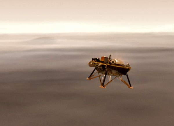 A computer-generated image of NASA's InSight lander about to touch down on Mars.