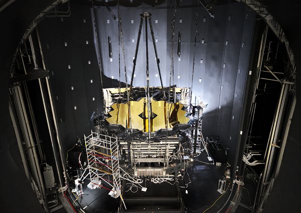 The large door of the Johnson Space Center's Chamber A is opened...revealing NASA's James Webb Space Telescope after it completed cryogenic testing on November 18, 2017.