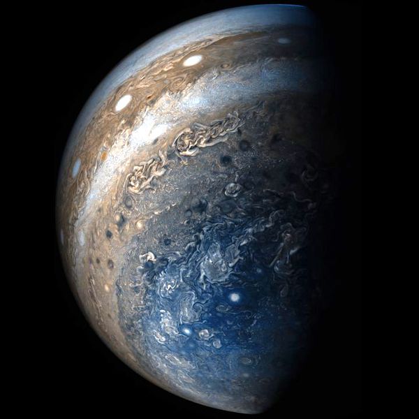 An image of Jupiter that was taken by NASA's Juno spacecraft from a distance of 29,100 miles (46,900 kilometers)...on May 19, 2017.