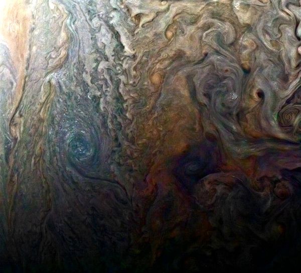 Jupiter's cloud tops as seen by NASA's Juno spacecraft from a distance of 9,000 miles (14,500 kilometers)...on February 2, 2017.