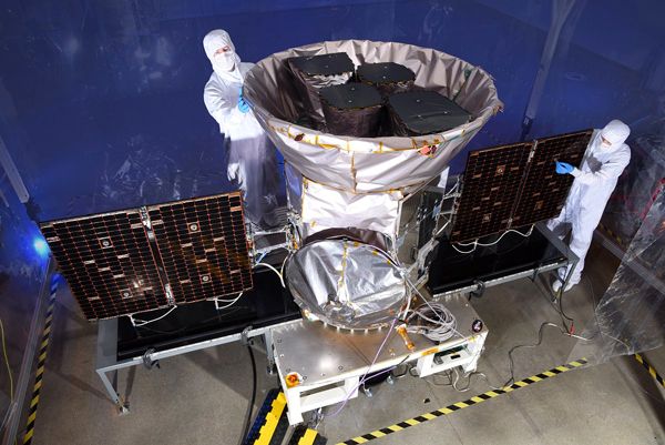 A file photo of Orbital ATK engineers working on NASA's TESS spacecraft...scheduled to launch no earlier than April 16, 2018.