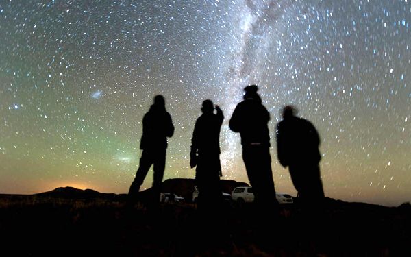 Four members of the South African observation team for NASA's New Horizons mission scan the sky while waiting for the start of the 2014 MU69 occultation...on June 3, 2017.