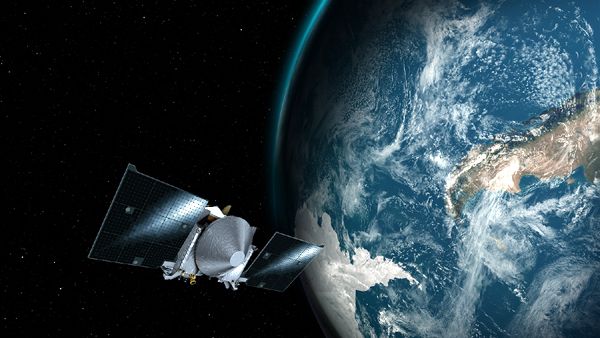 An artist's concept of NASA's OSIRIS-REx spacecraft flying past Earth on its way to asteroid Bennu...on September 22, 2017.