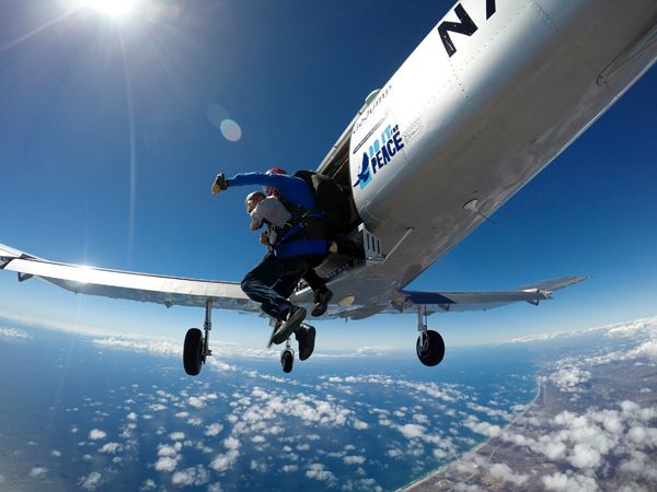 My tandem instructor and I exit the aircraft 13,000 feet above the city of Oceanside in California...on October 4, 2018.