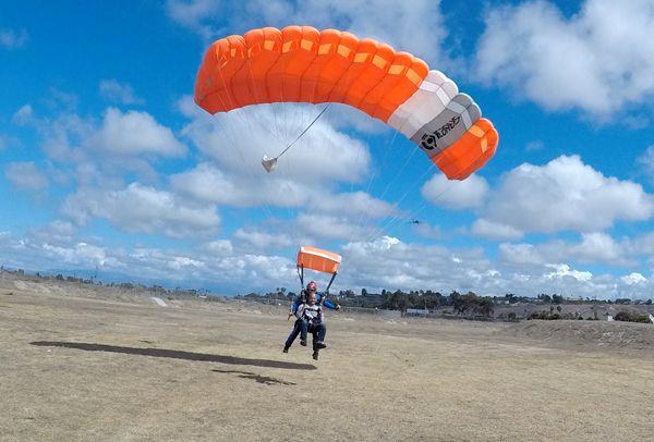 My tandem instructor and I are about to touch down at the landing zone in Oceanside, California...safely completing my fifth skydive ever on October 4, 2018.