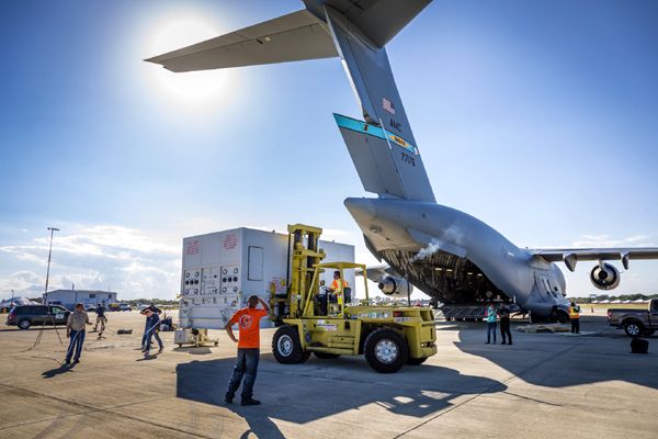 In Titusville, Florida, NASA's Parker Solar Probe spacecraft—formerly known as Solar Probe Plus—is unloaded from a U.S. Air Force C-17 aircraft before being transported to Astrotech Space Operations for launch preparation...on April 3, 2018.