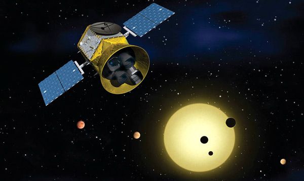An artist's concept of NASA's Transiting Exoplanet Survey Satellite (TESS) hunting for alien worlds.