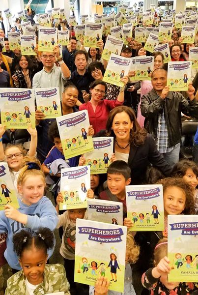 U.S. Senator Kamala Harris takes part in a group photo before the reading and signing of her new book SUPERHEROES ARE EVERYWHERE inside Barnes & Noble bookstore at The Grove in Los Angeles...on January 13, 2019.