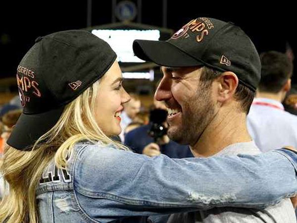 Supermodel Kate Upton and her fiancé/Astros pitcher Justin Verlander share a moment after Houston won the World Series at Dodgers Stadium...on November 1, 2017.
