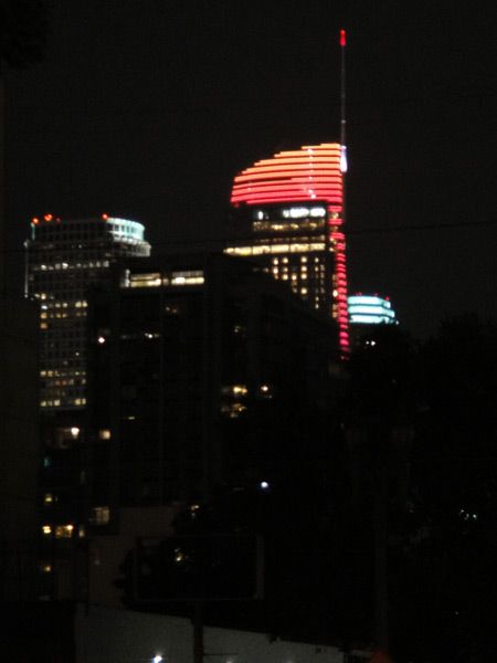The rooftop sail of the Wilshire Grand Center is lit up in red, orange and yellow to support Los Angeles' bid for the 2024 Summer Olympic Games...on May 10, 2017.