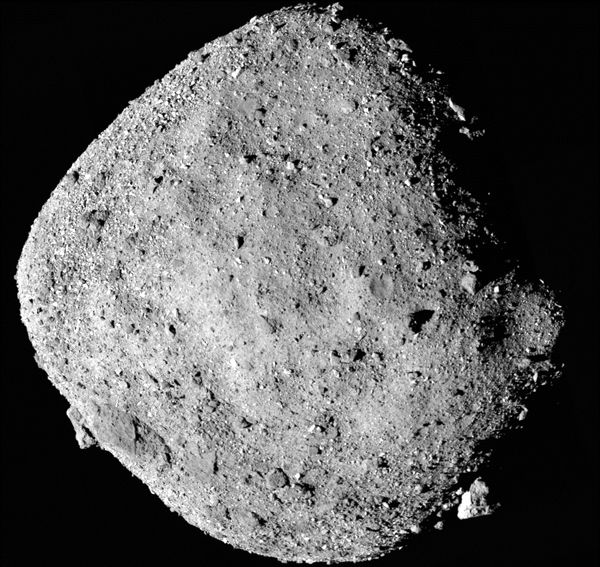 A mosaic image of asteroid Bennu that was taken by NASA's OSIRIS-REx spacecraft from a distance of 15 miles (24 kilometers)...on December 2, 2018.