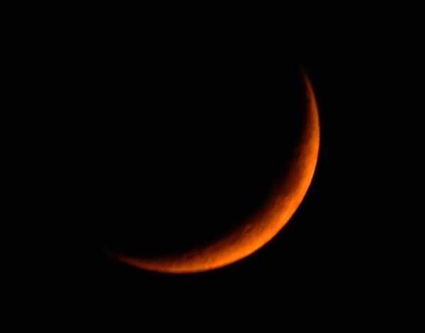 A snapshot I took of the Waxing Crescent Moon...which was tinted orange by smoke coming from the Woolsey Fire near Malibu, California, on November 10, 2018.