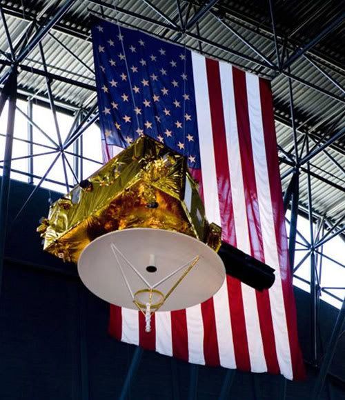 A full-size replica of the New Horizons spacecraft hangs from the rafters of the Udvar-Hazy Center in Washington, D.C.