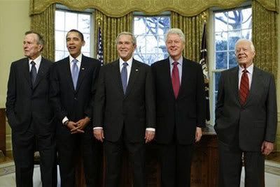 President George W. Bush poses with President-elect Barack Obama, and former presidents, from left, George H.W. Bush, Bill Clinton and Jimmy Carter, Wednesday, Jan. 7, 2009, in the Oval Office of the White House in Washington.