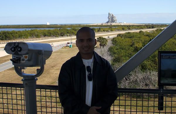 Posing with space shuttle Discovery behind me, on February 8, 2009.