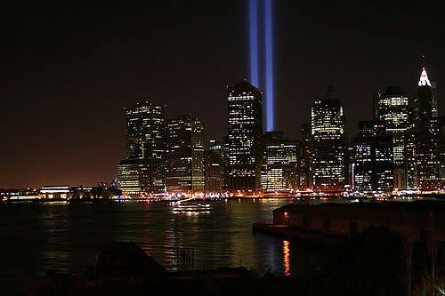 Twin beams representing the World Trade Centers shine high above New York City, on the one-year anniversary of 9/11.