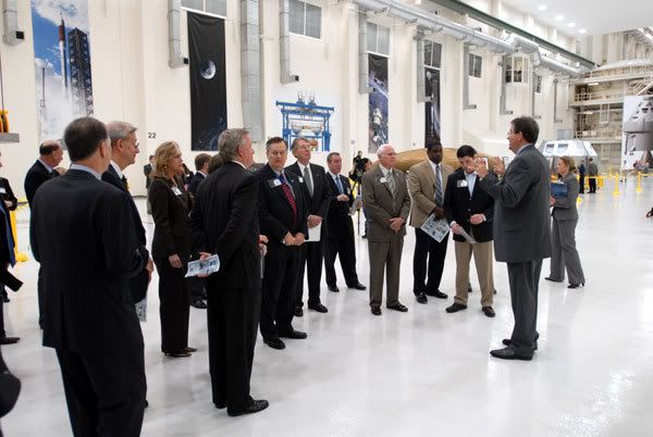 Delegates gather inside the newly-refurbished Operations & Checkout Facility at Kennedy Space Center in Florida.