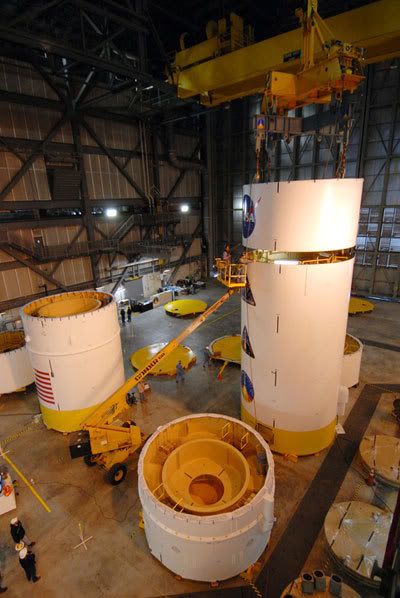 Various segments making up the upper stage simulator on the Ares I-X rocket are being mated together at Kennedy Space Center in Florida.