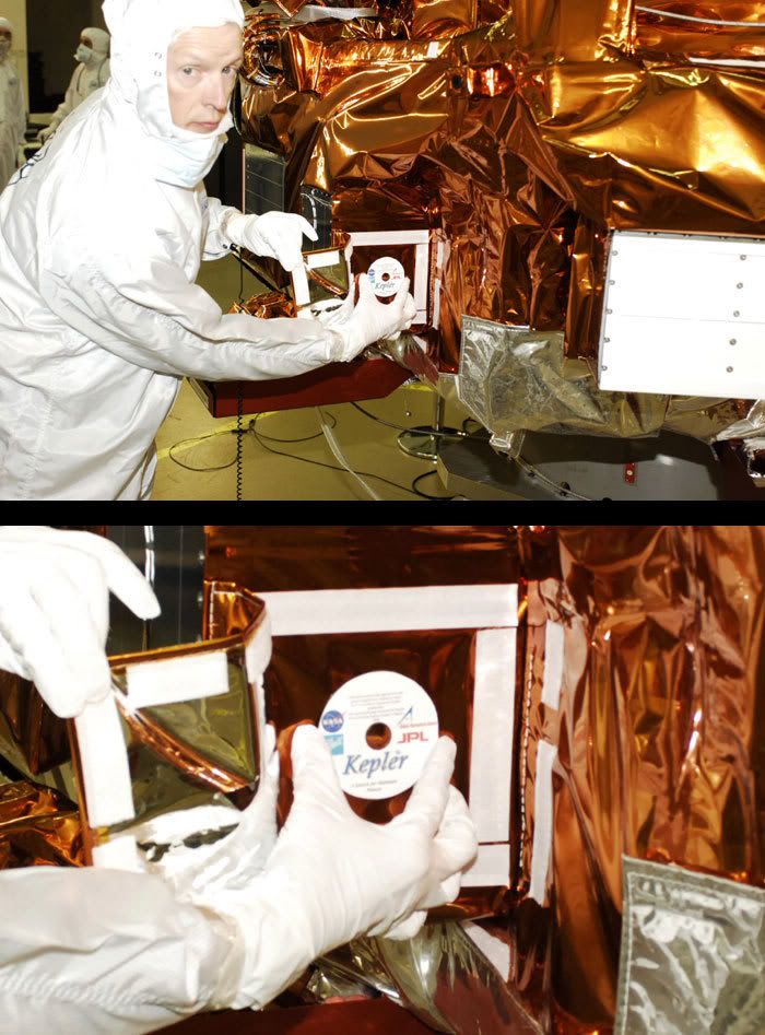 A Ball Aerospace technician prepares to attach the 'Name In Space' DVD onto the Kepler spacecraft.
