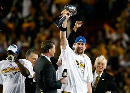 Steelers quarterback Ben Roethlisberger celebrates with the NFL Trophy after his team won 27-23 against the Arizona Cardinals in Super Bowl XLIII, on February 1, 2009.