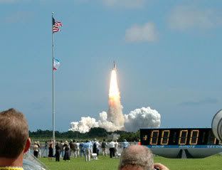 Media photographers watch as Space shuttle Atlantis launches on mission to the International Space Station on September 9, 2006, at 8:14:55 AM (Pacific Daylight Time).