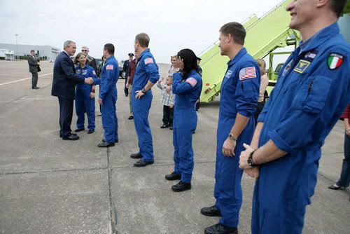 President Bush greets the STS-120 crew outside Air Force One, on the tarmac at Ellington Field in Houston, Texas.