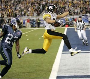 Hines Ward scores a touchdown during the Pittsburgh Steelers' 21-10 victory over the Seattle Seahawks in Super Bowl XL.