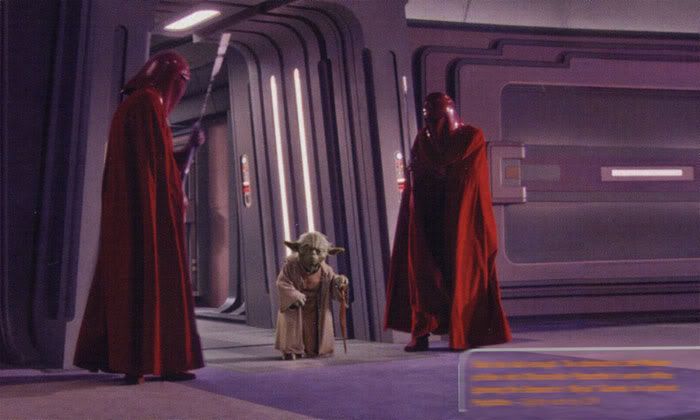 The Imperial Guards of Palpatine look down at Yoda, as the Jedi Master arrives at the newly-proclaimed Emperor's office.