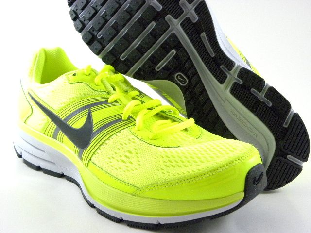 grey and neon green nike shoes