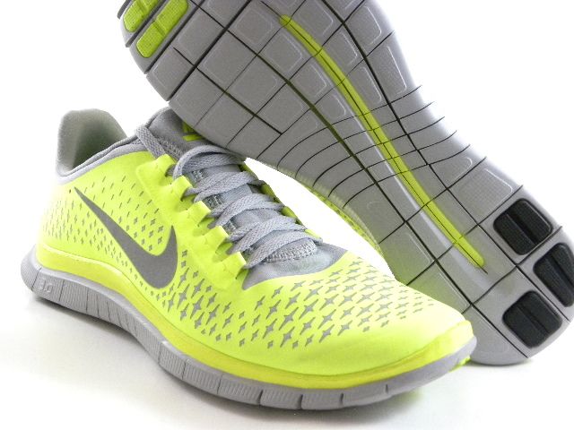 grey and green nike trainers