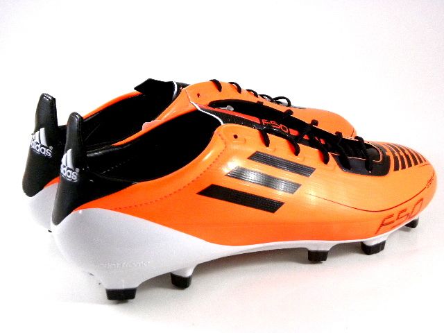 black and orange soccer cleats