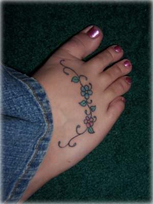 ^Here are the promised tattoo pics. The blue forget-me-not is my Grandpa and 