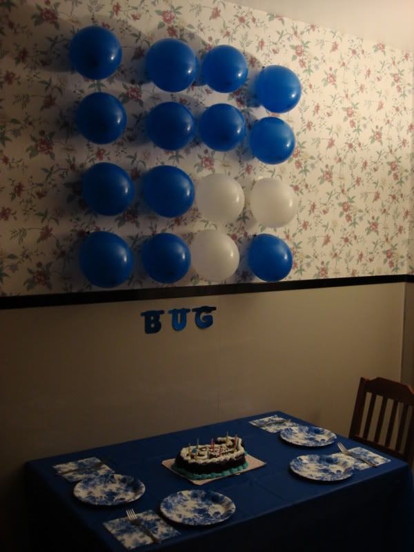 Bee spelled Bug's birthday in binary with blue balloons