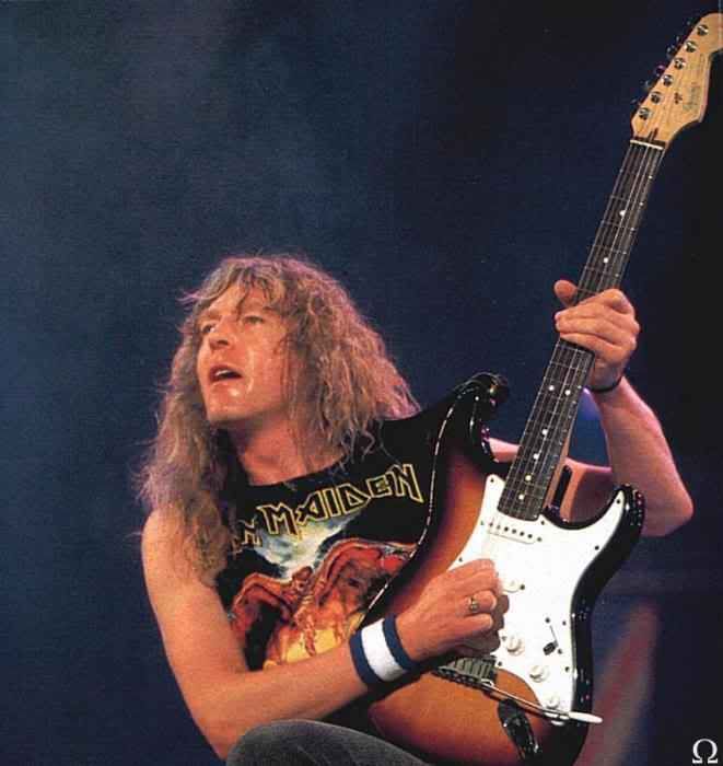 JanickInDonington1992WithGuitarUp.jpg