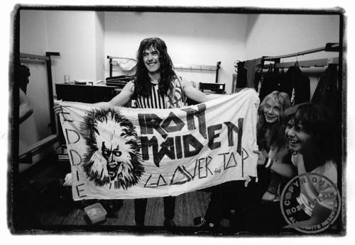 SteveWithIronMaidenFlagWithDaveCliveInDressroom.jpg