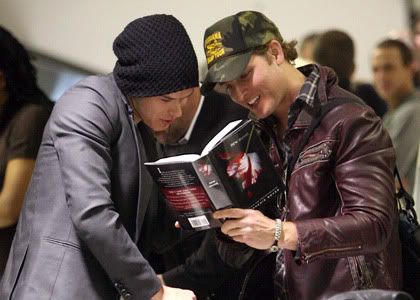 Kellan Lutz and Peter Fancinelli reading New Moon Pictures, Images and Photos