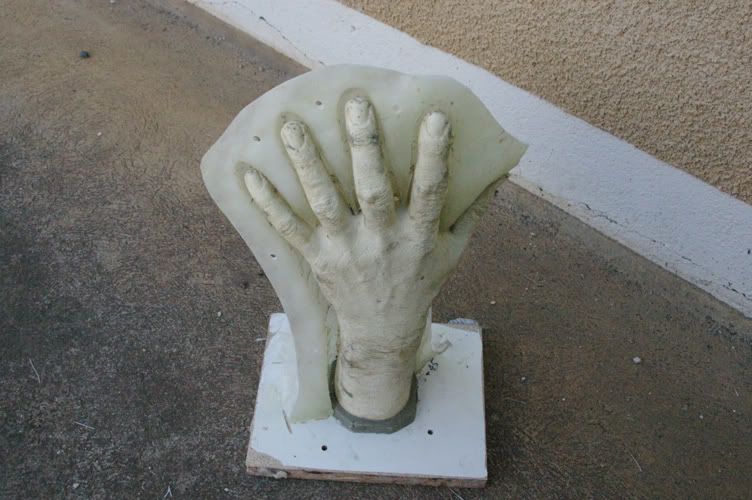 glovesculptcheckingclearances.jpg