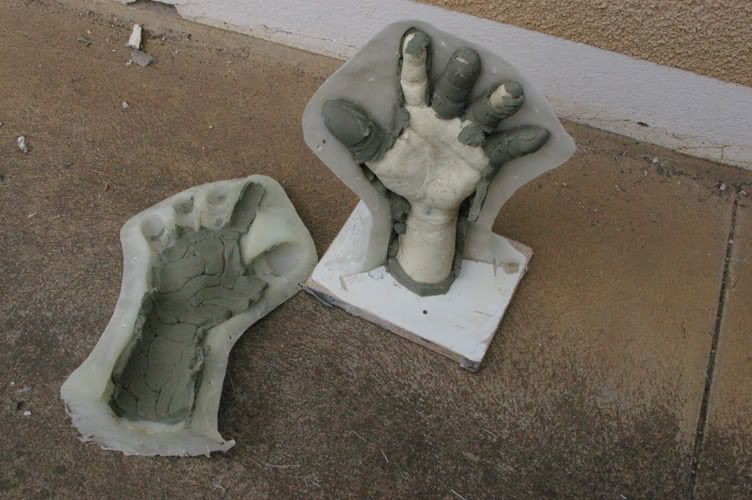 glovesculptopeningthemould.jpg