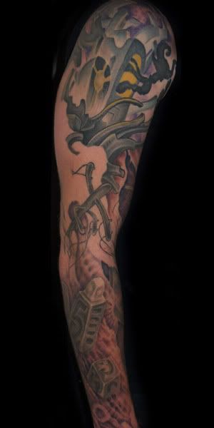 biomech cityscape tattoo