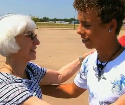  photo elderly_woman_embraces_teen-CBSvid_zpsb5ccfcb5.jpg