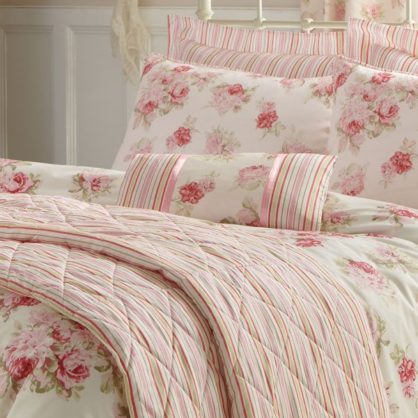 photo isabella-dunelm-pink-floral-stripe-filled-boudoir-cushion_zps5761556e.jpg
